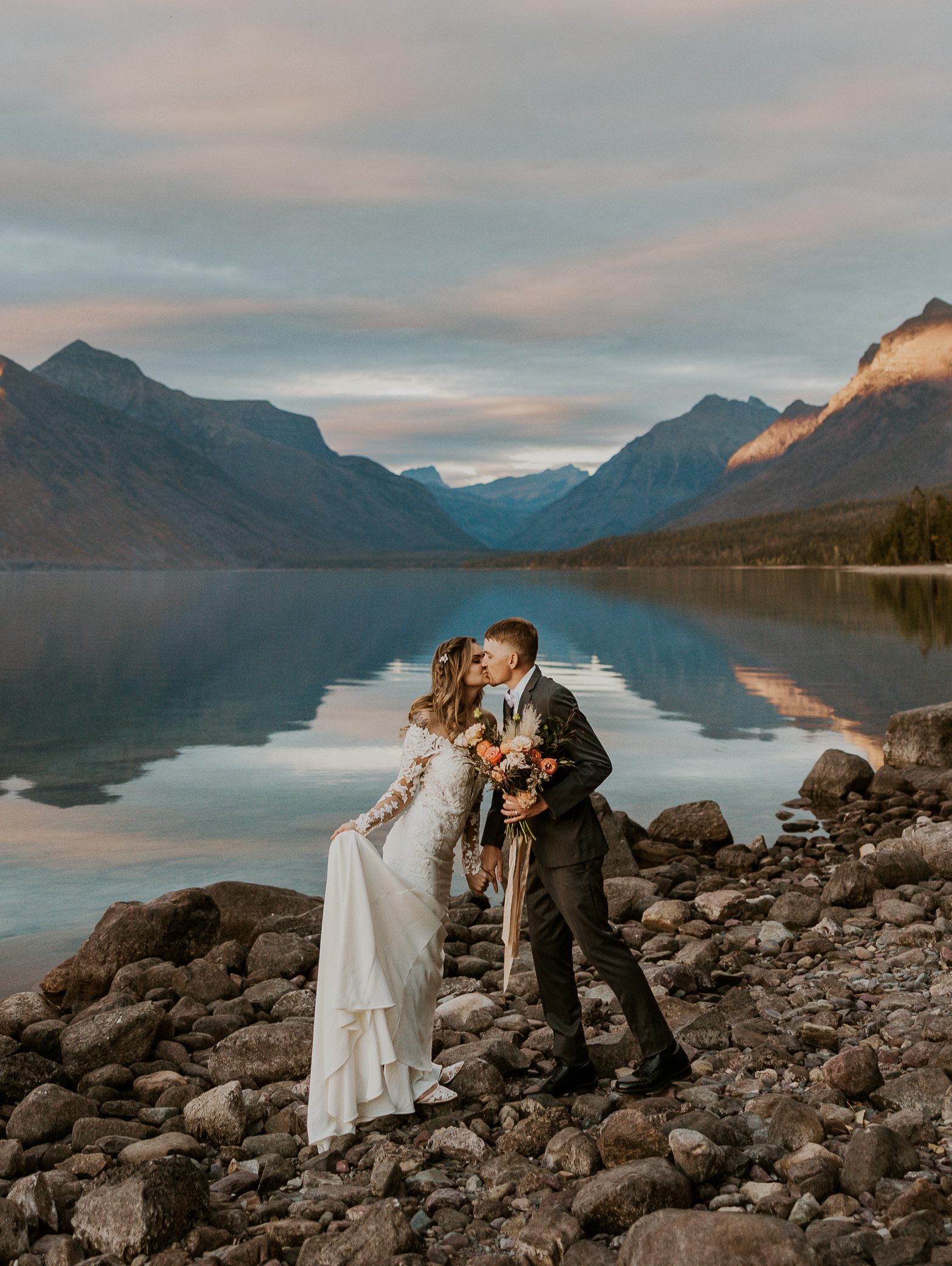 10-mile pullout (Jackson Bay) Elopement Location Bride and groom kissing in Glacier National Park