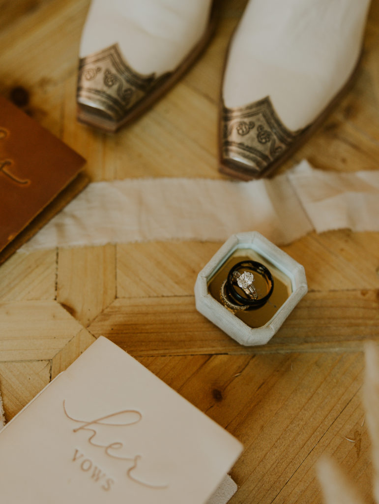 Shoe, ring and vows flat lay. Elopement Photography by Haley Jessat