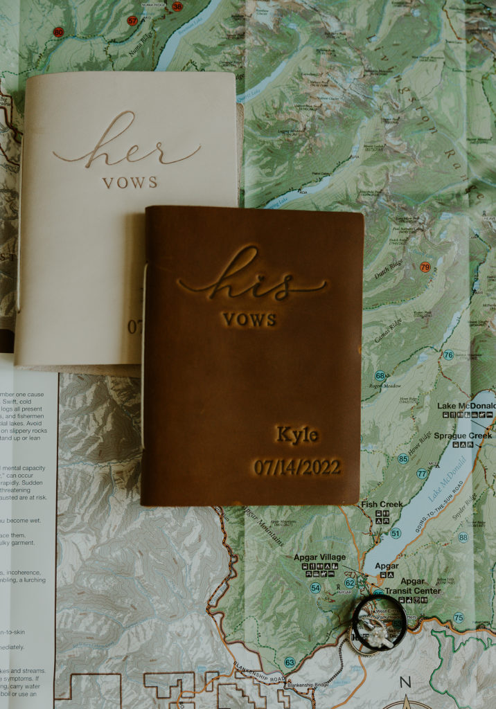Wedding ring, vows and map flat lay. Elopement Photography by Haley Jessat