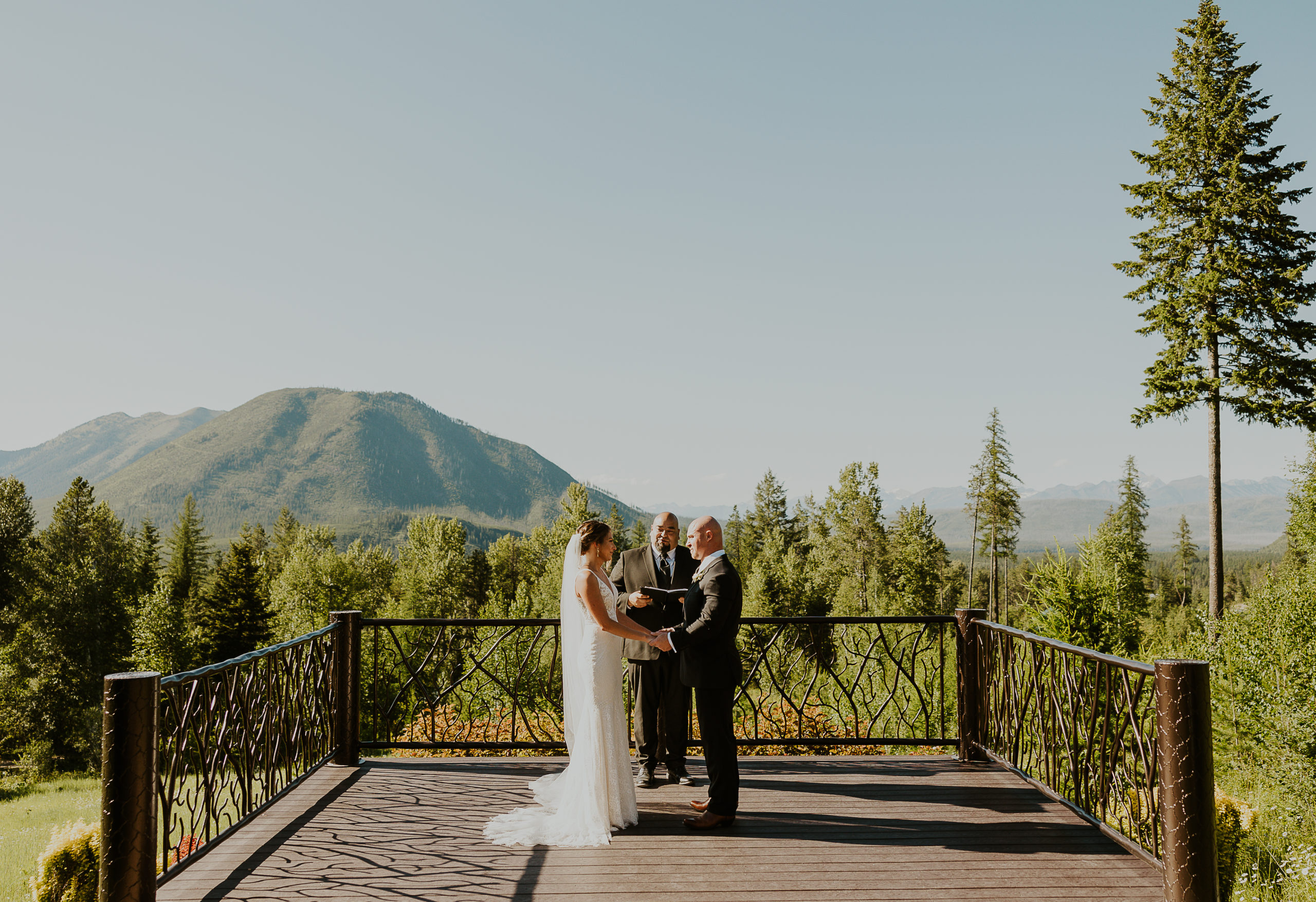 Wedding Ceremony at Glacier Raft Co Wedding and Events in Park View Pavilion. Photo by Haley Jessat