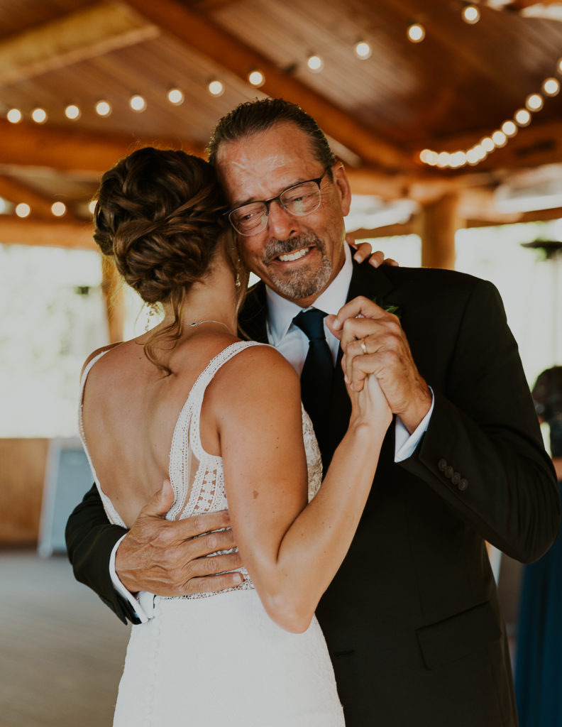 Glacier Raft Co Elopement near Glacier National Park. Reception photo of the father and daughter dance. Montana Wedding Photography by Haley Jessat