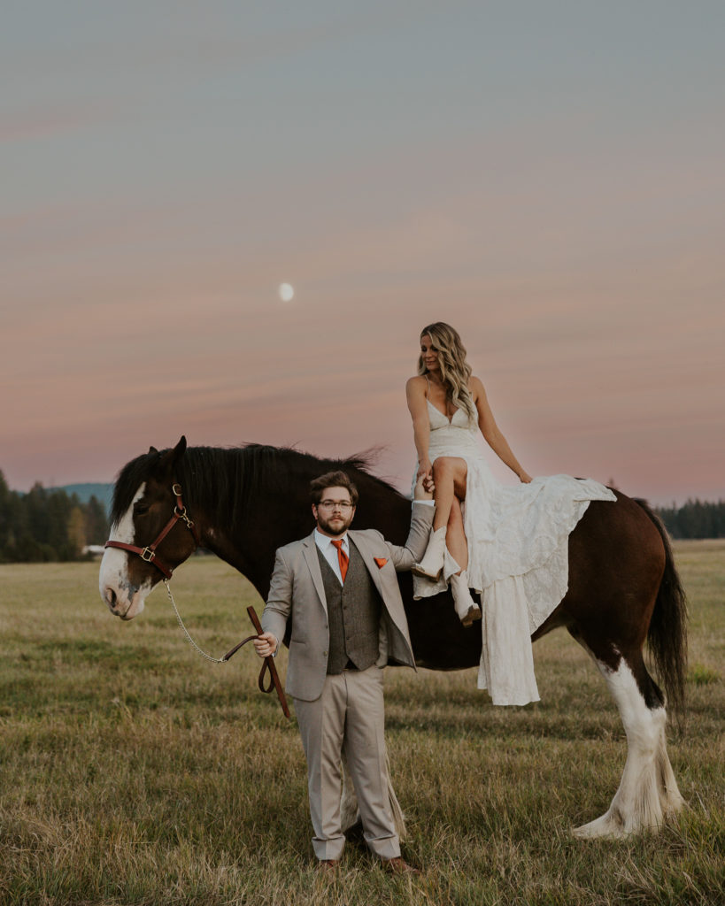 Bride on Clydesdale Photography by HaleyJPhoto