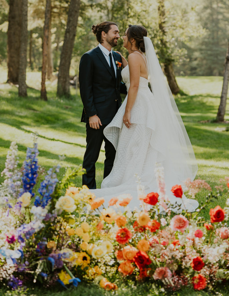 Forage and Floral Wedding Flowers at Haymoon Ranch Pavillion Whitefish Montana. Forage and Floral rainbow wedding florals