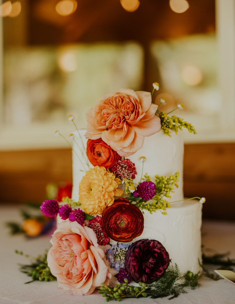 Wedding cake with bright flowers