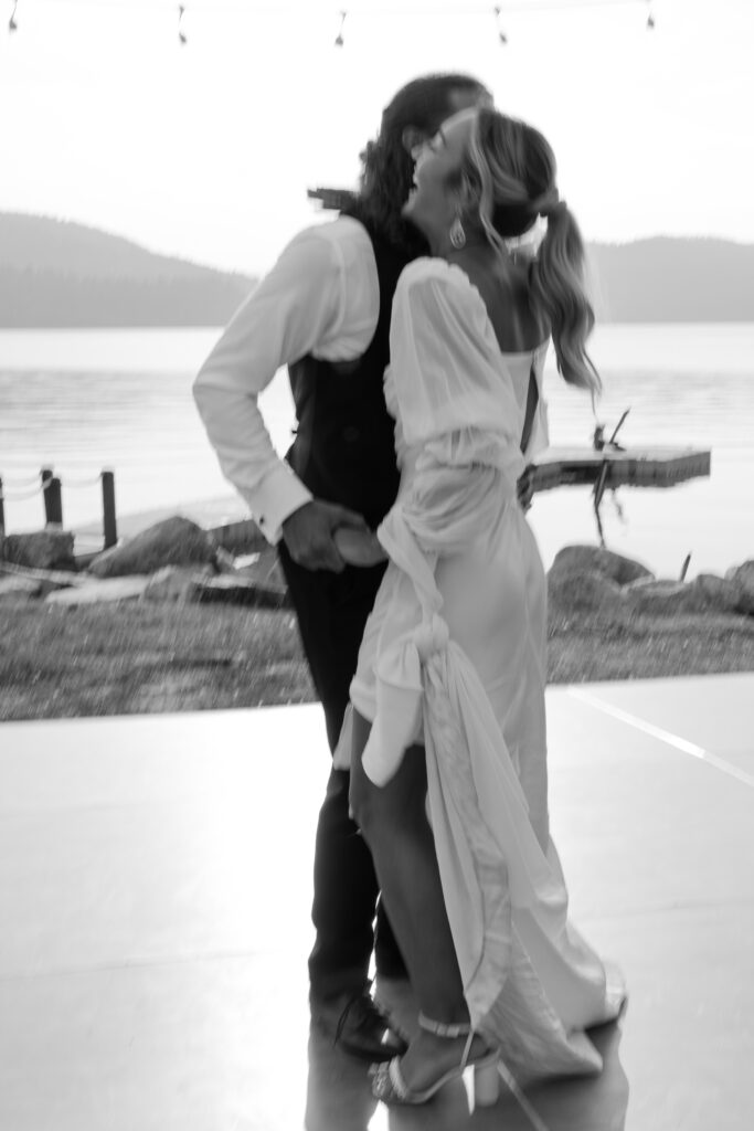 Bride and groom first dance at The Lodge at Whitefish Lake wedding venue