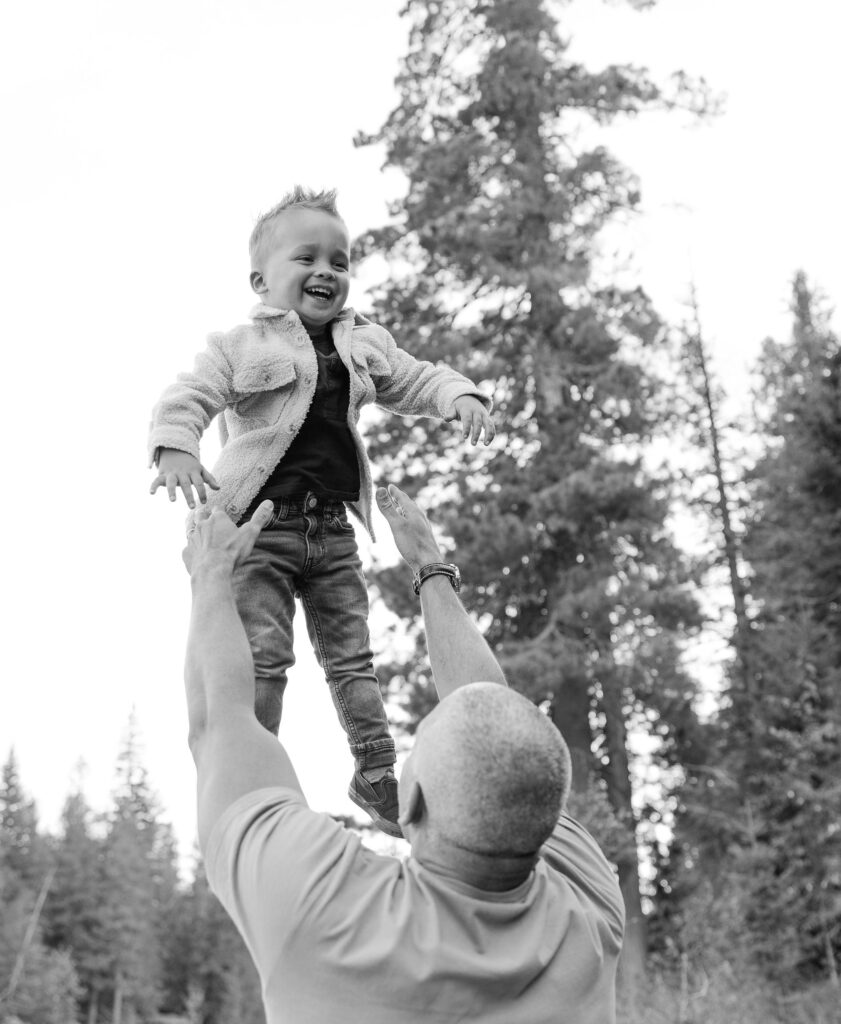 Father and son - black and white - glacier national park
