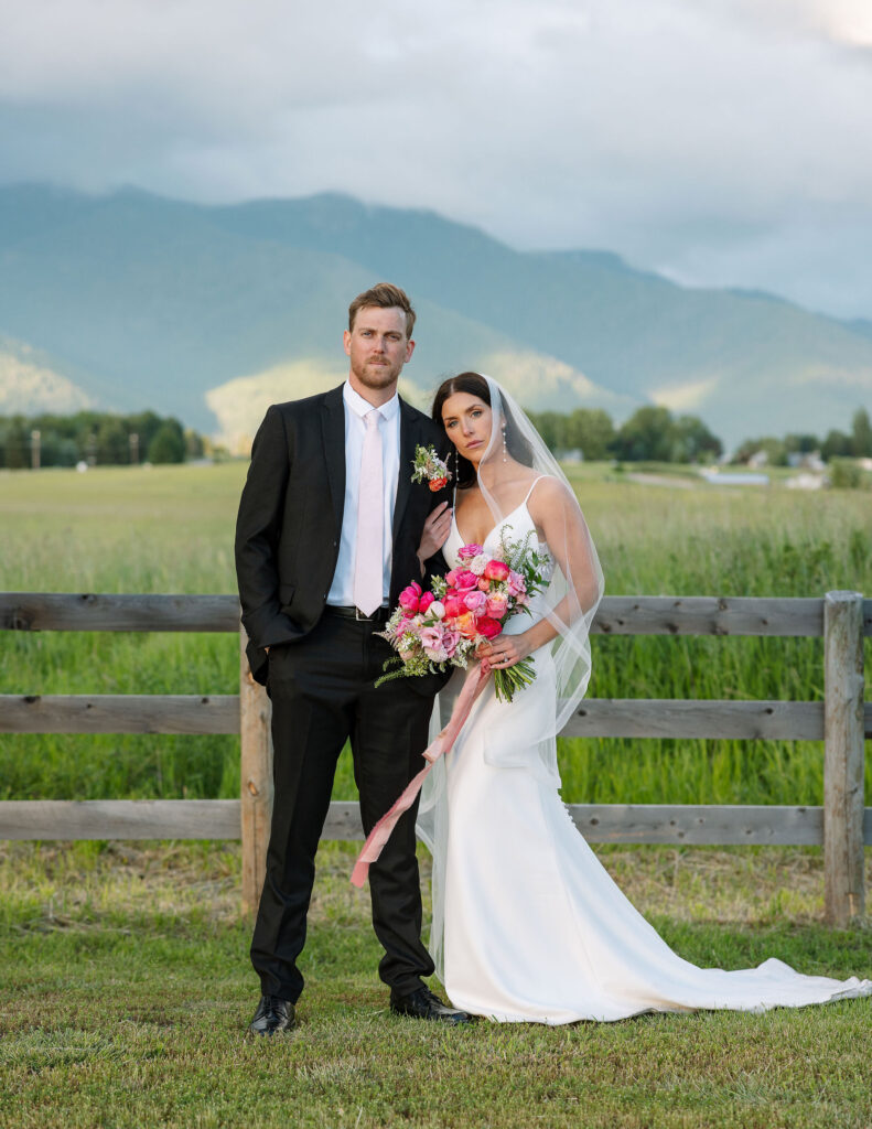 Bride twirling with her veil, creating a magical moment in Montana wedding photography by Haley J Photo.