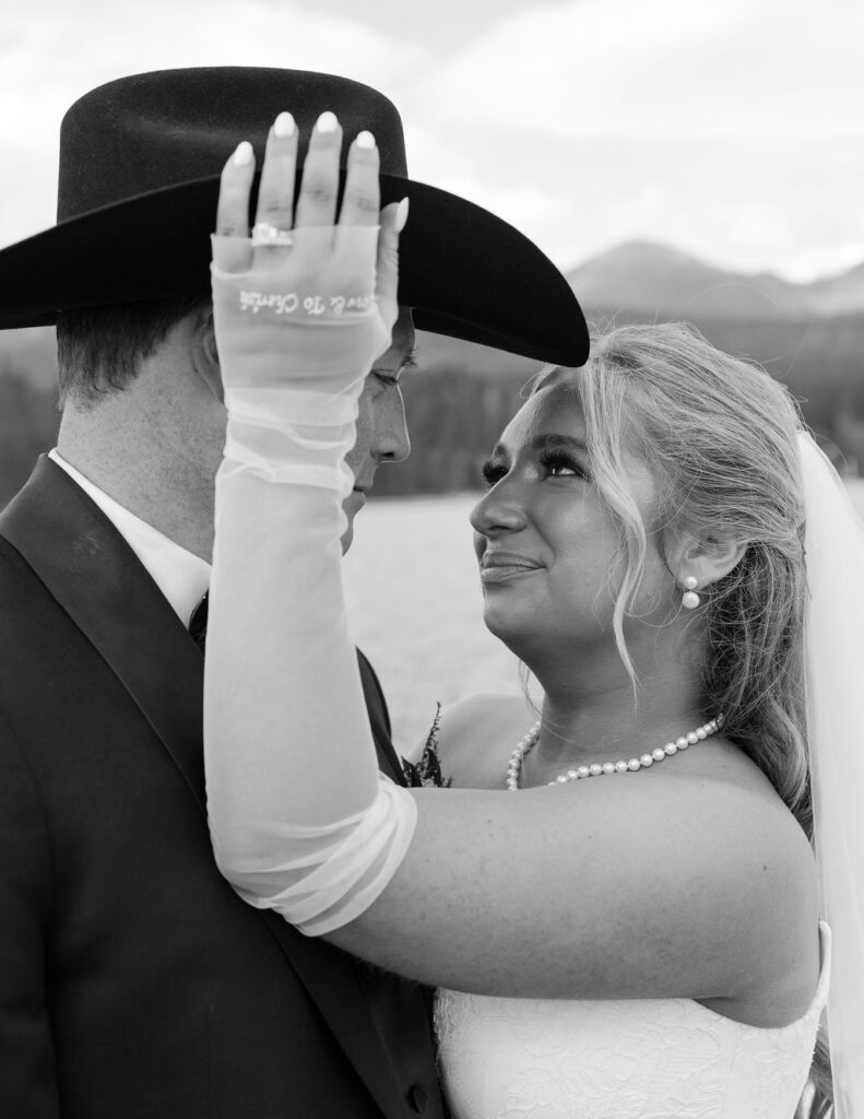Bride raises hand to groom in emotional moment after Whitefish Montana ceremony