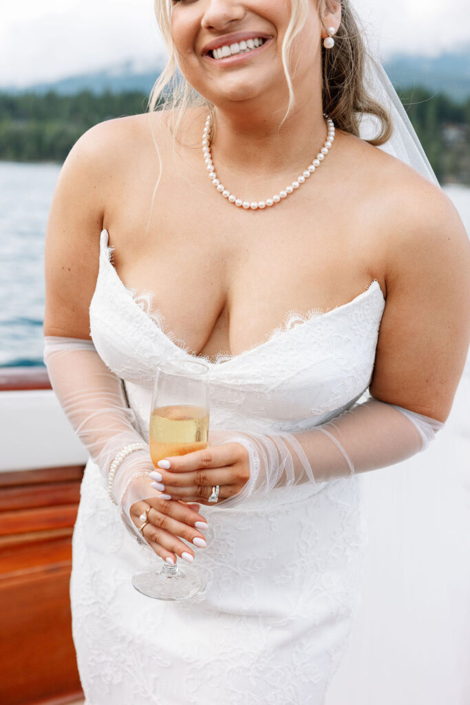 Bride’s sheer gloves and pearl details add vintage touch to Whitefish Montana wedding look