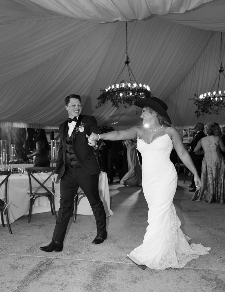 Black-and-white moment of couple dancing at Whitefish Montana wedding reception