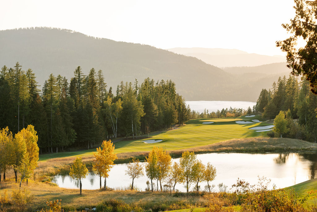 View of the Iron Horse golf course and lake at golden hour on the night before the wedding in Whitefish, Montana