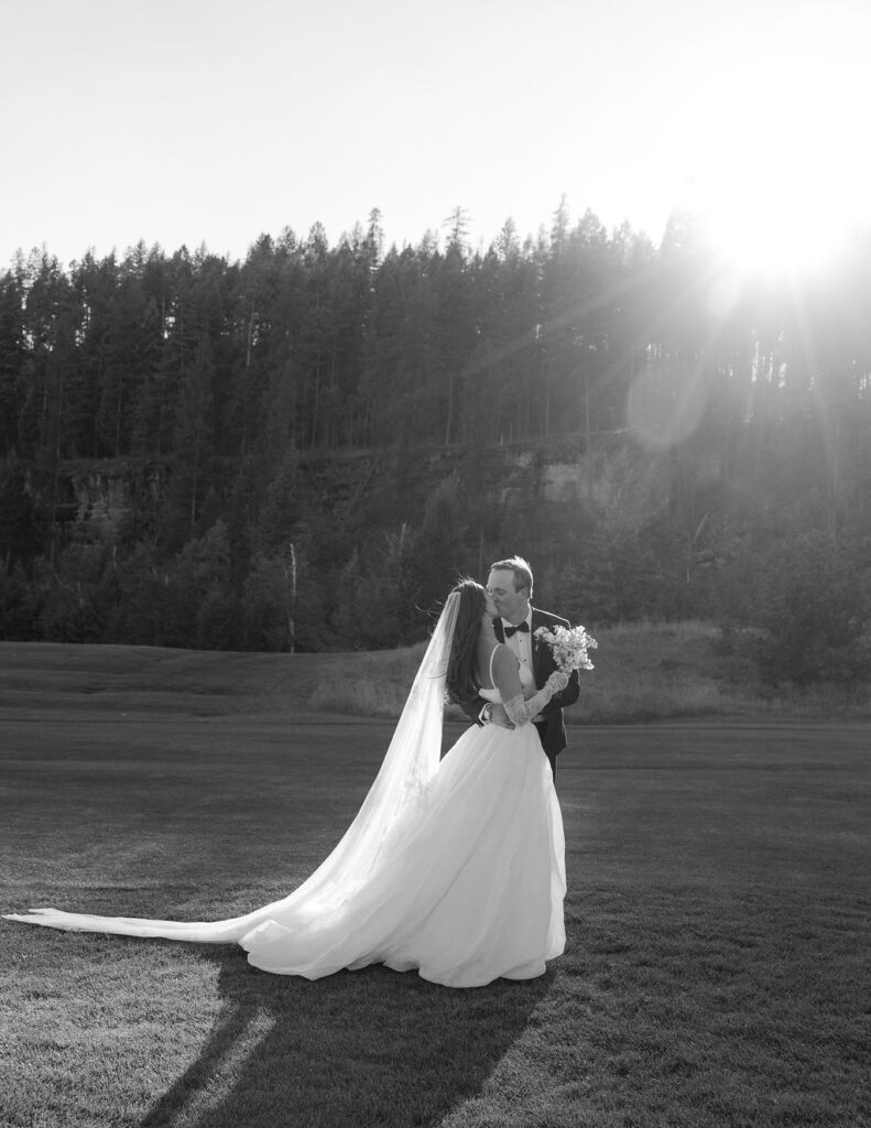 Bride and groom embracing