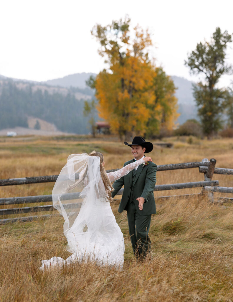 Bride and groom portrait in meadow photographed by Montana wedding photographer Haley J Photo