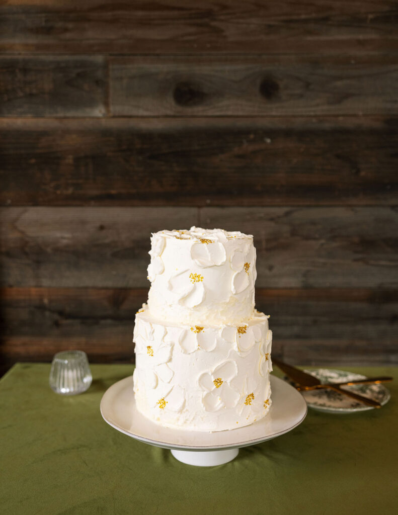 Wedding cake display at The Meadows on Rock Creek wedding photographed by Haley J Photo