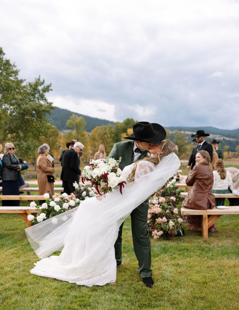 Bride and groom walking down the aisle at The Meadows on Rock Creek wedding