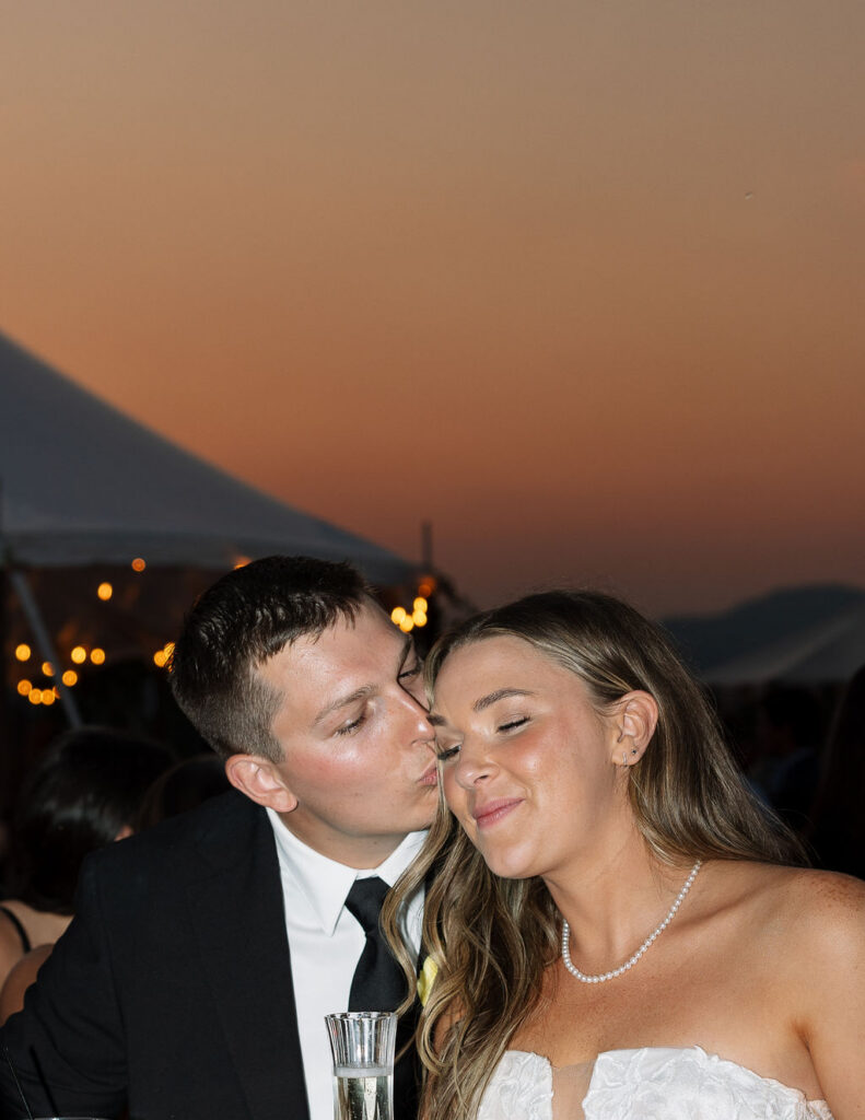 Bride and groom sharing a quiet moment together during sunset at their summer wedding in Whitefish Montana photographed by Haley Jessat